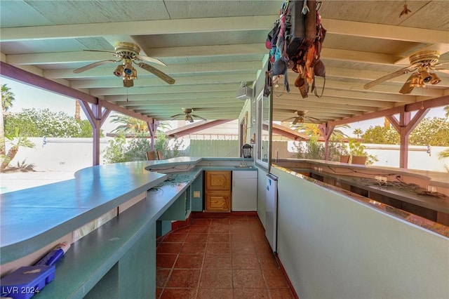 4020 Shadow Wood Ave, Las Vegas, NV 89121 - view of patio featuring a ceiling fan, fence, and an outdoor kitchen