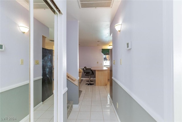 4020 Shadow Wood Ave, Las Vegas, NV 89121 - corridor featuring light tile patterned flooring and baseboards