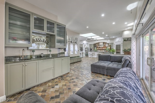 living room featuring recessed lighting and wet bar