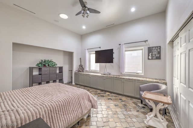bedroom with recessed lighting and a ceiling fan