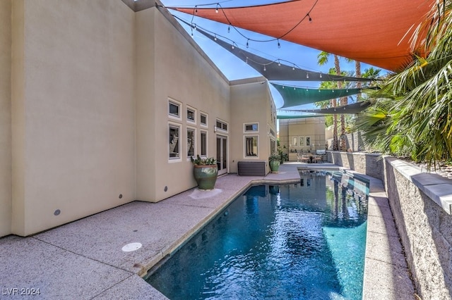 pool with a patio