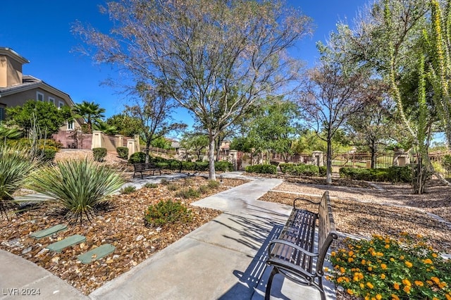 view of property's community with fence