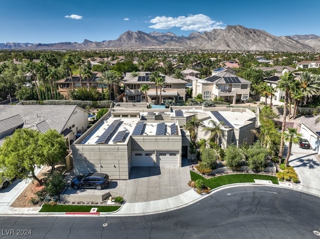 bird's eye view featuring a residential view and a mountain view