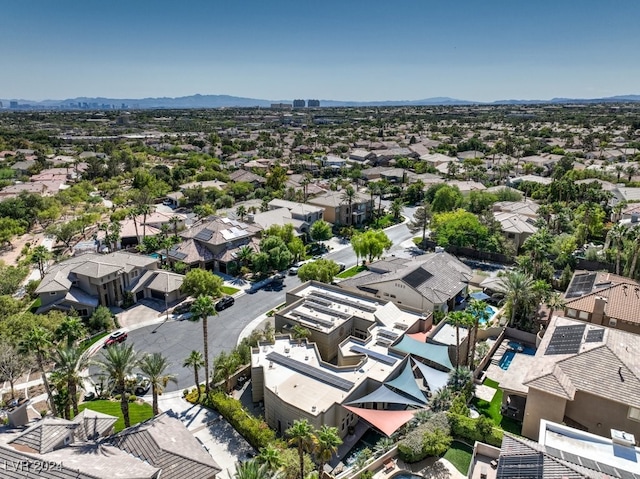 birds eye view of property with a mountain view and a residential view