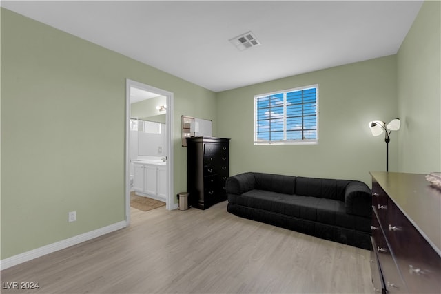 living room with light hardwood / wood-style floors