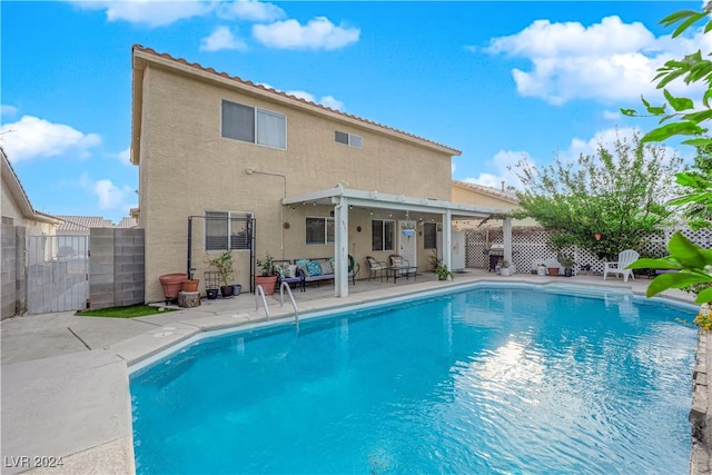 view of swimming pool with a patio