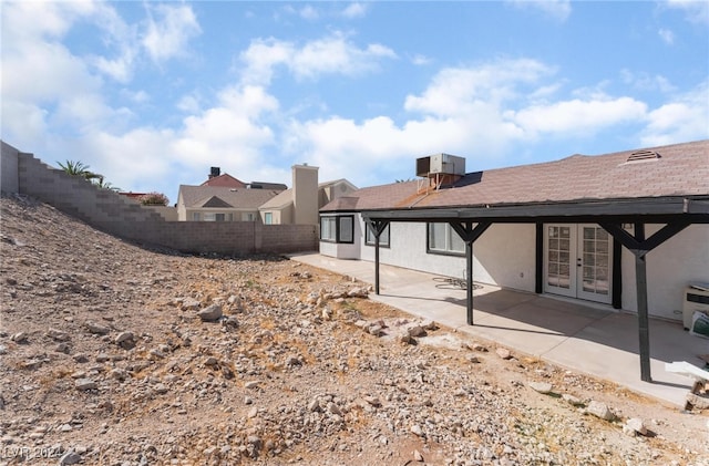 view of yard with a patio area and central air condition unit