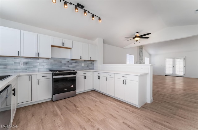 kitchen with lofted ceiling, light hardwood / wood-style floors, appliances with stainless steel finishes, and white cabinetry