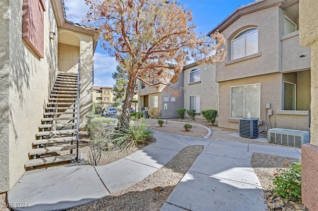 view of property's community with a patio area