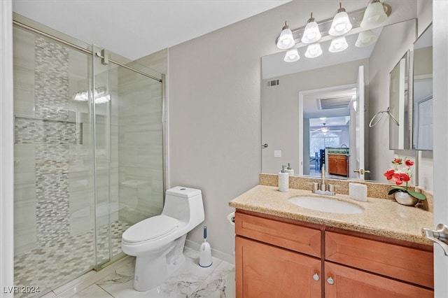 bathroom featuring an enclosed shower, vanity, and toilet