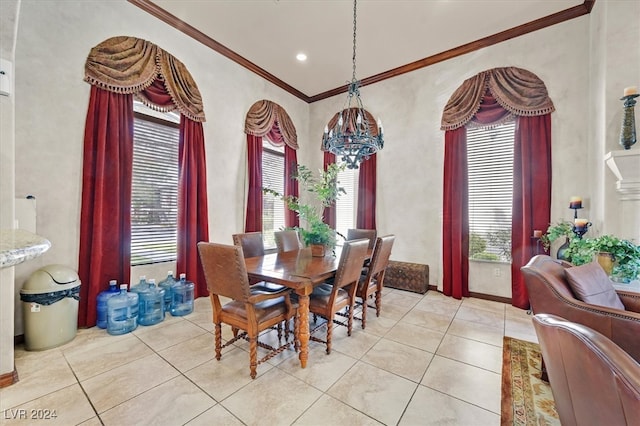 tiled dining area featuring crown molding and a chandelier