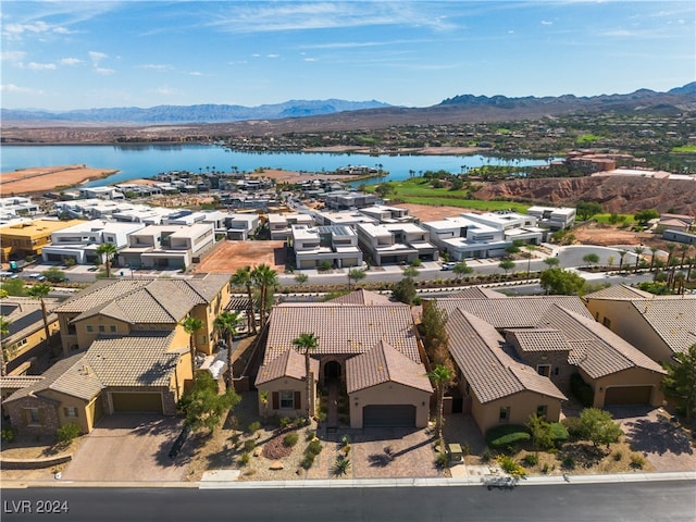 bird's eye view featuring a water and mountain view