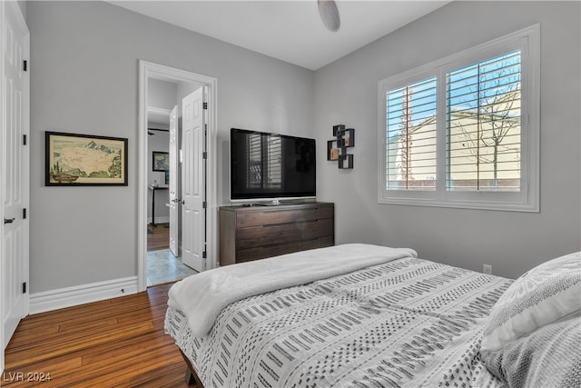 bedroom featuring ceiling fan and hardwood / wood-style floors