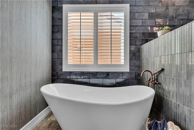 bathroom featuring a tub