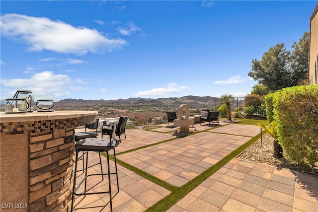 view of patio with a mountain view