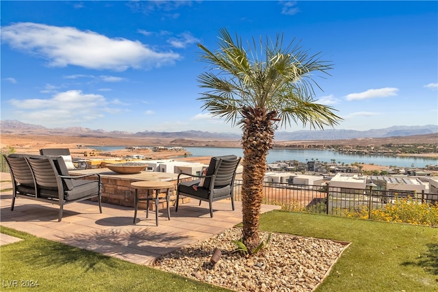 exterior space featuring a water and mountain view