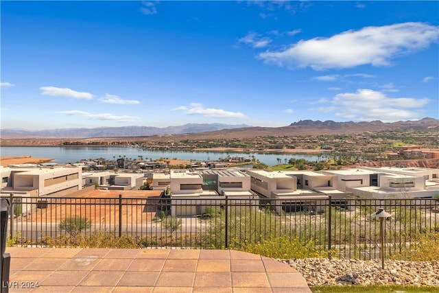 view of mountain feature with a water view