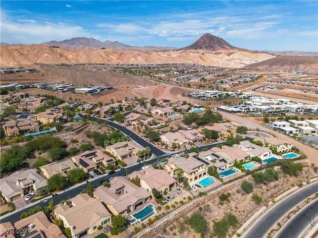 drone / aerial view featuring a mountain view