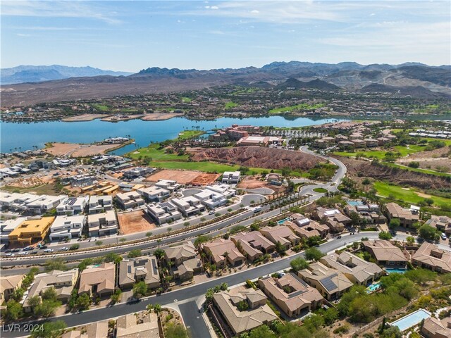 bird's eye view featuring a water and mountain view