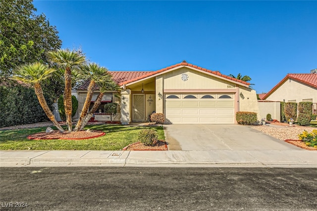 view of front of property featuring a garage