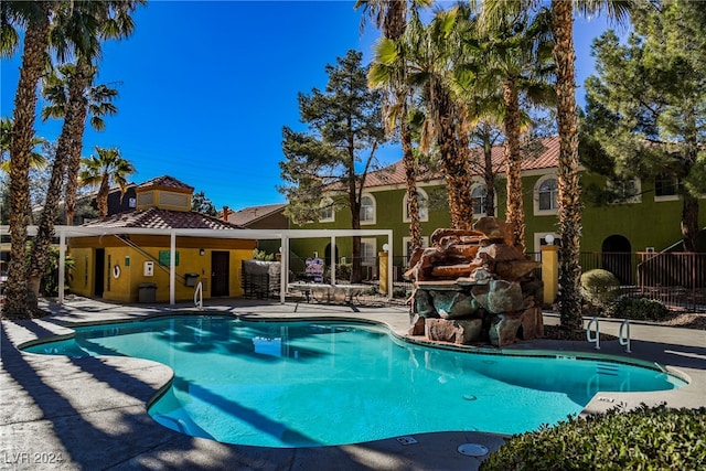 view of swimming pool featuring a patio