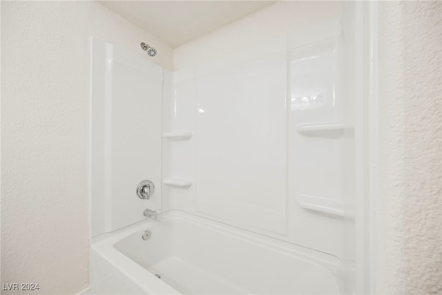 bathroom with shower / tub combination