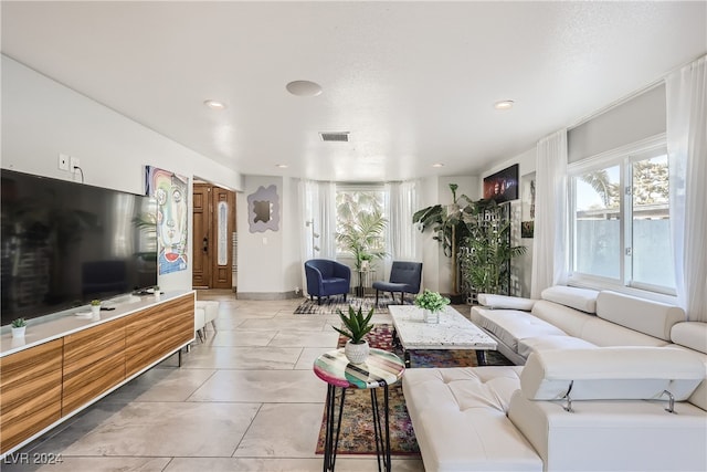 living room featuring light tile patterned floors