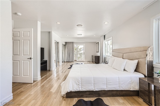 bedroom with light wood-type flooring