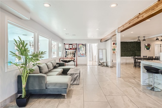 living room with beamed ceiling