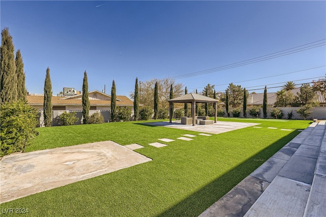 view of yard with a gazebo and a patio