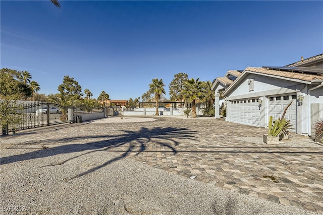 view of yard featuring a garage