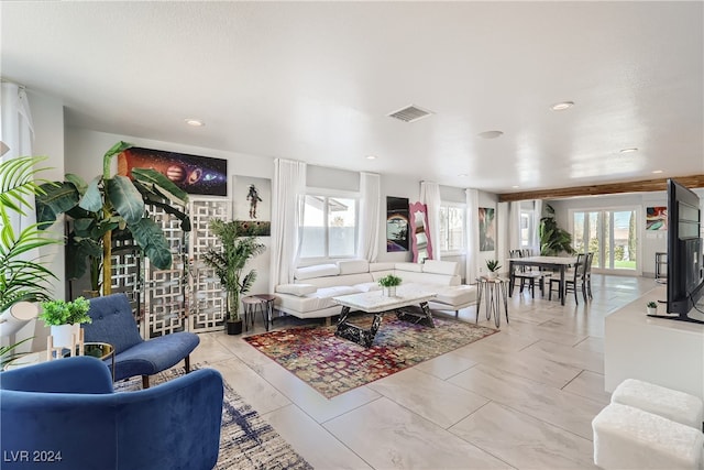 living room featuring plenty of natural light