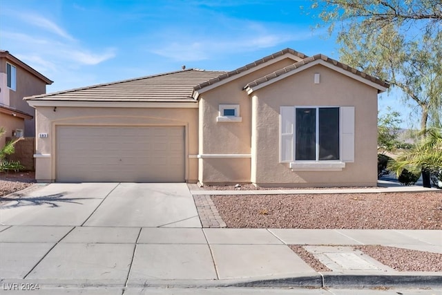 single story home with a garage