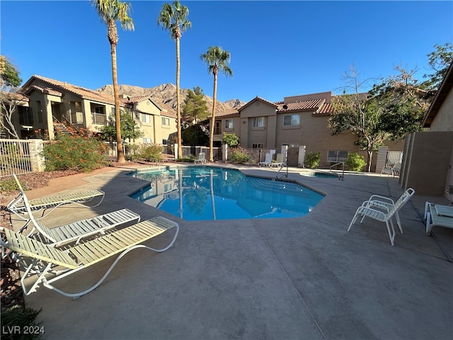 view of pool featuring a patio