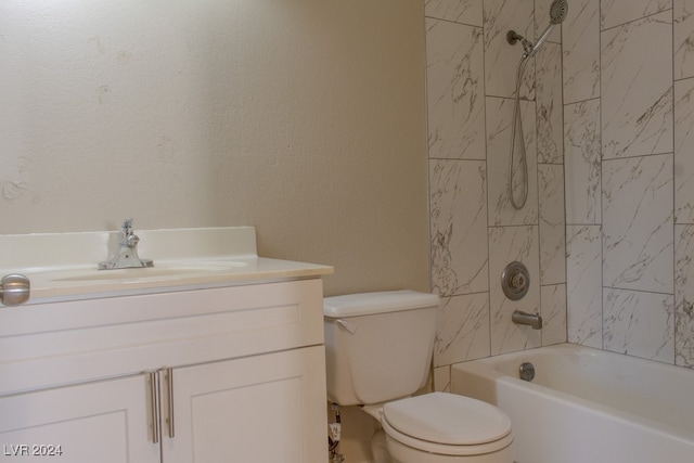 full bathroom with vanity, toilet, and tiled shower / bath combo