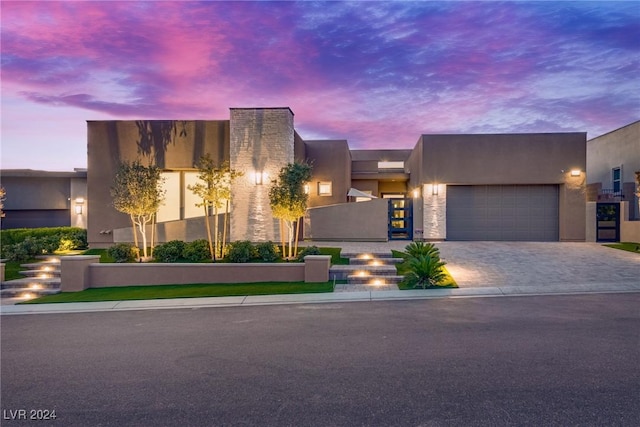 view of front of home with a garage