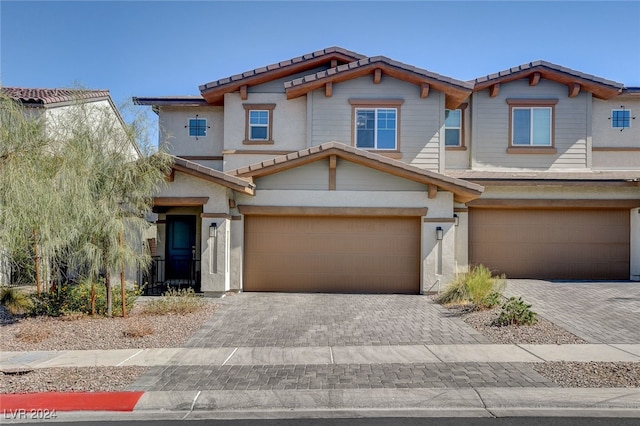 view of front of property with a garage