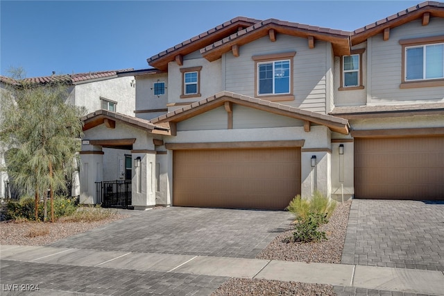 view of front of home with a garage