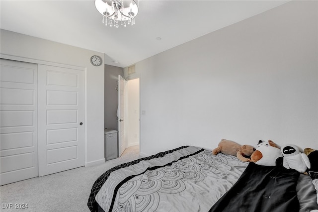 carpeted bedroom featuring a closet