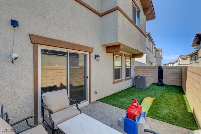 view of patio with cooling unit