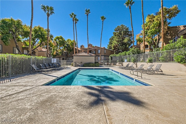 view of swimming pool featuring a patio