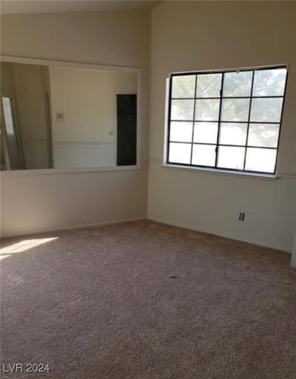 unfurnished room featuring carpet flooring