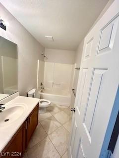 full bathroom featuring shower / tub combination, tile patterned floors, vanity, and toilet