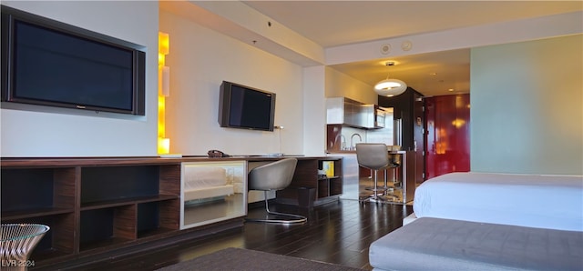 bedroom featuring dark hardwood / wood-style floors