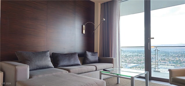 carpeted living room featuring a wealth of natural light