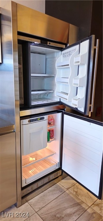 kitchen featuring fridge