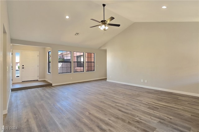 unfurnished living room featuring ceiling fan, wood-type flooring, and high vaulted ceiling