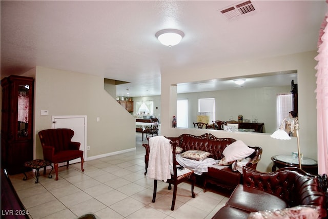 living room with light tile patterned floors