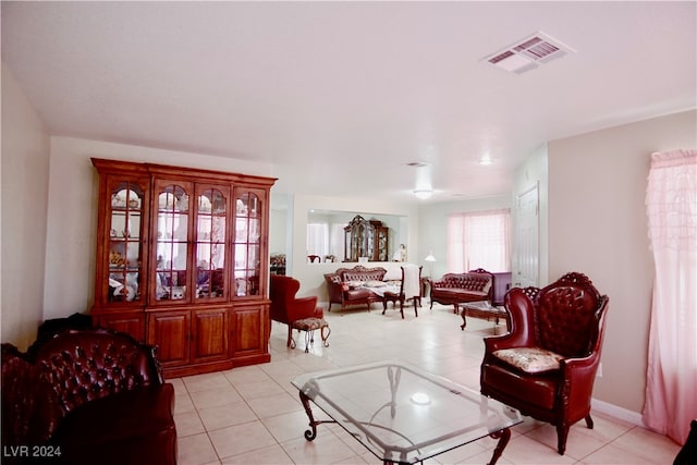 sitting room with light tile patterned floors