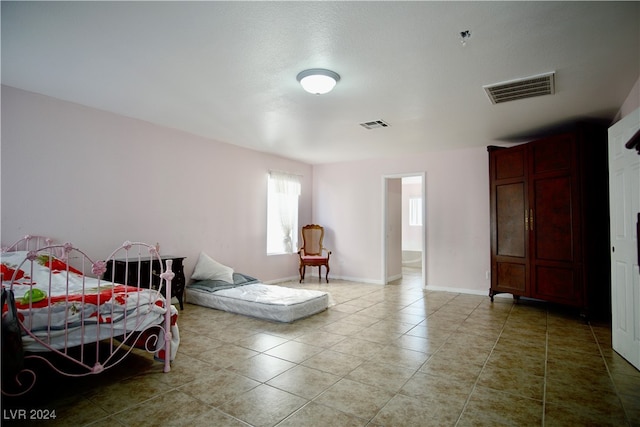 view of tiled bedroom